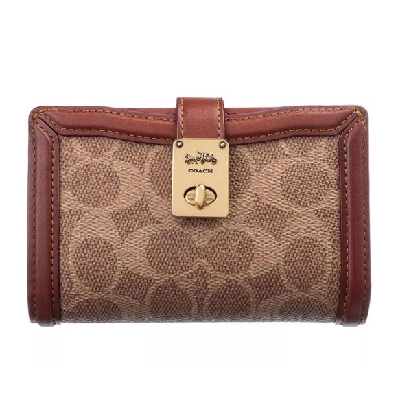 Coach Handbags - Coach Hutton Wallet In Signature
Canvas Brass / Tan Rust